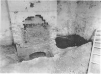 Figure 2: Excavations in the 1940s of the fireplace and the northwest corner of the South Pavilion