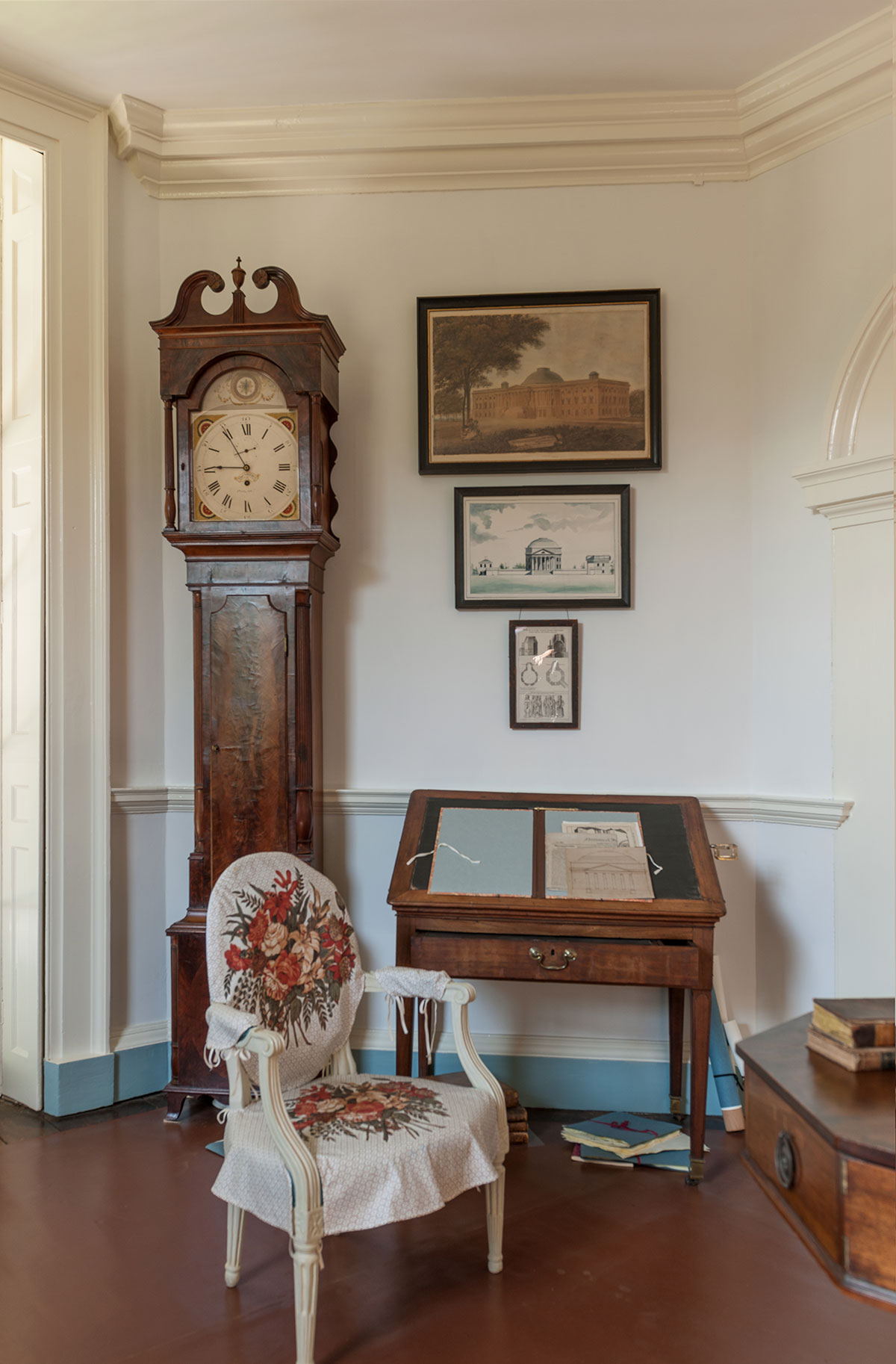 The restored Library at Monticello showing a slipcover one of Jefferson's French armchairs