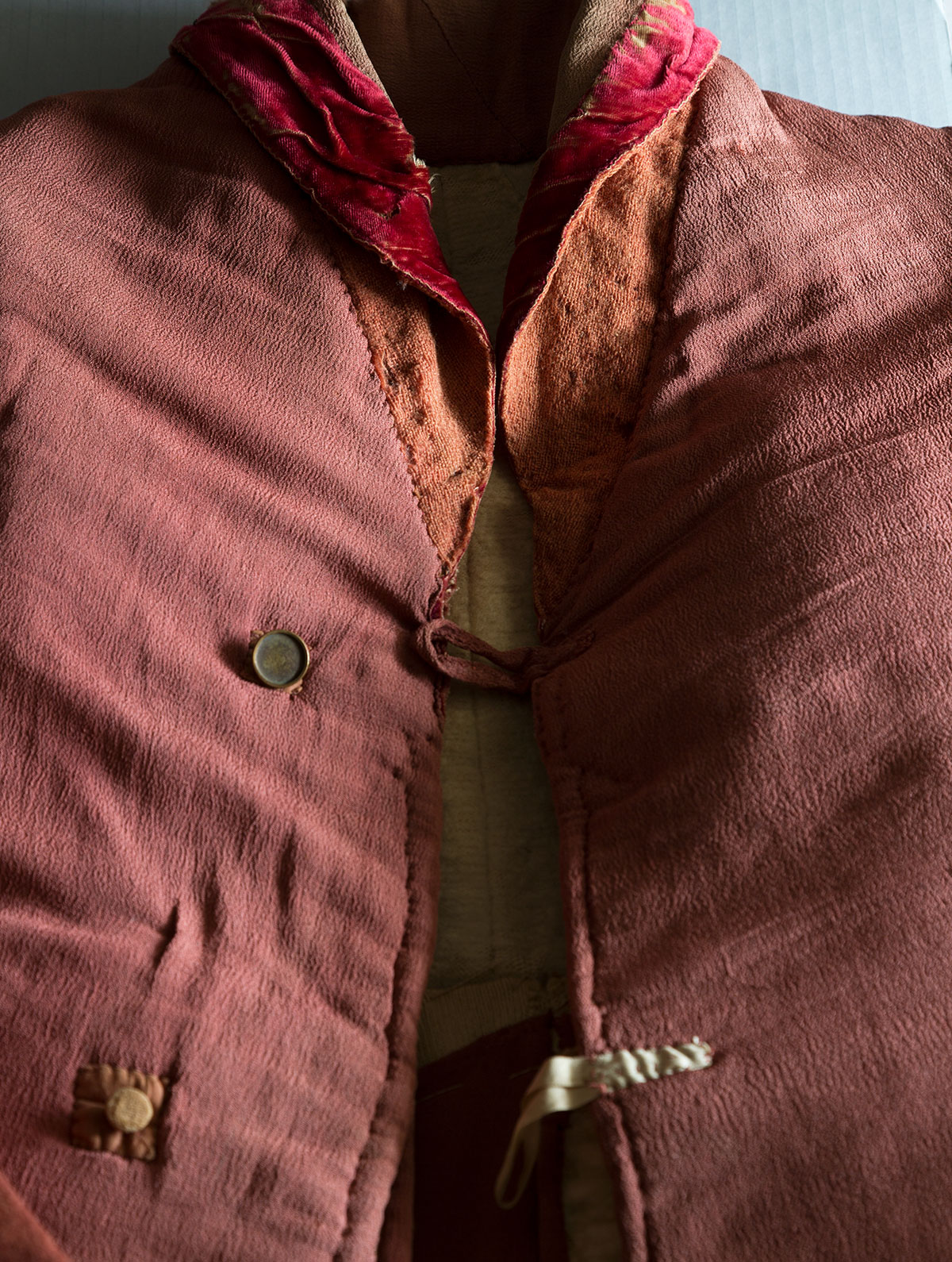 Miguel Flores-Vianna’s photo of Jefferson’s red waistcoat. The coat’s length was shortened during Jefferson’s lifetime, and it is marked with Jefferson’s initials and the year it was made. Courtesy of Cabana.