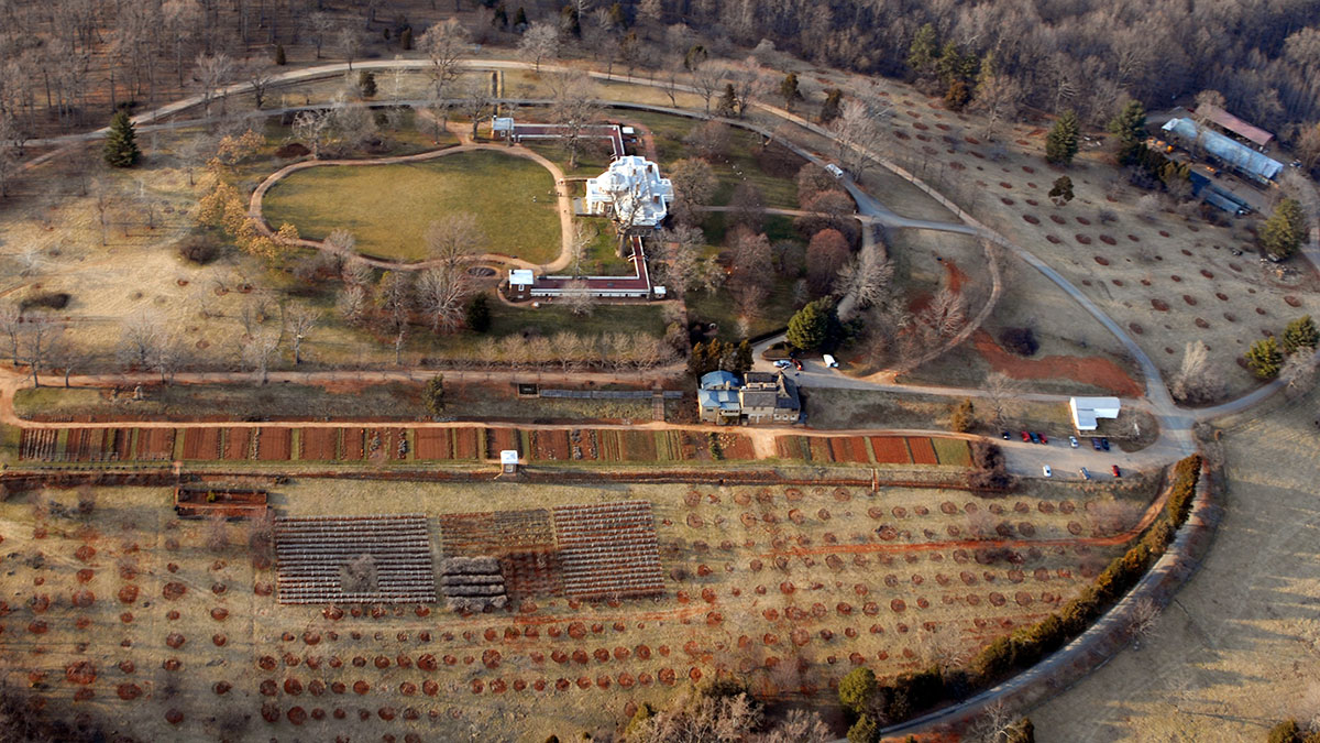 Aerial of Monticello mountain in winter showing the South and North Orchards
